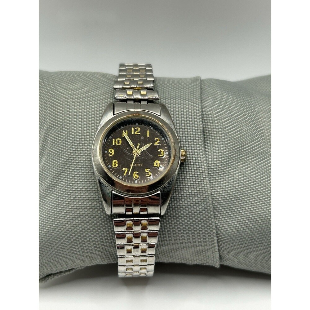 Vintage Ladies Quartz Watch Silver Tone Black Dial Gold Numerals Stretch Band